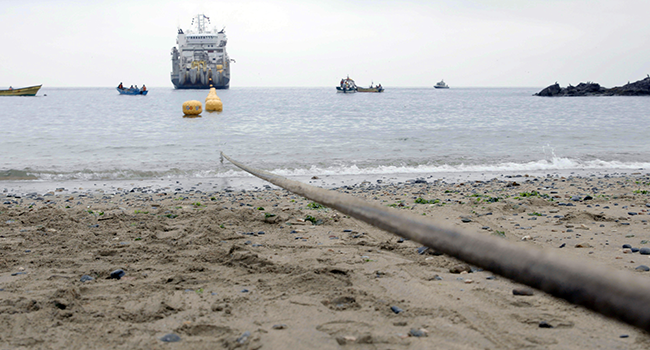 This photo, published by Google, shows a cable extending from the ocean.
